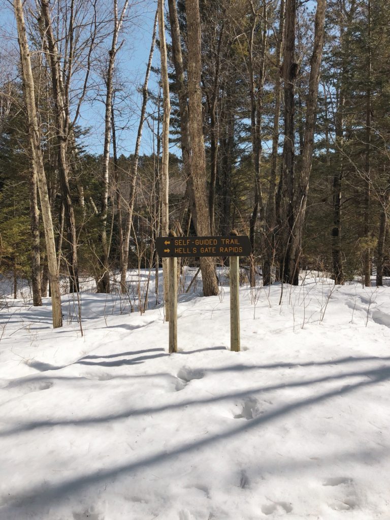 trail said, self-guided trail to the left, hell's gate rapids to the right