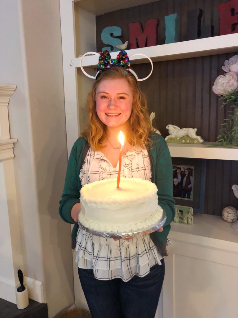 Hannah holding her birthday cake