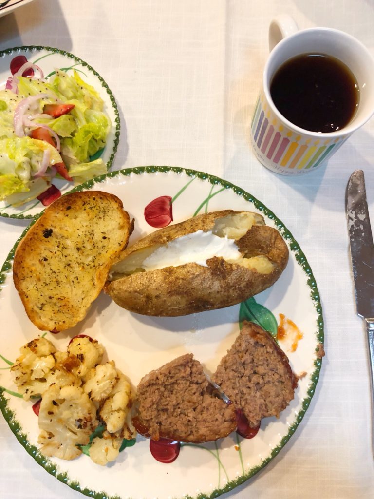 Grandma's delicious birthday dinner of meatloaf and baked potatoes